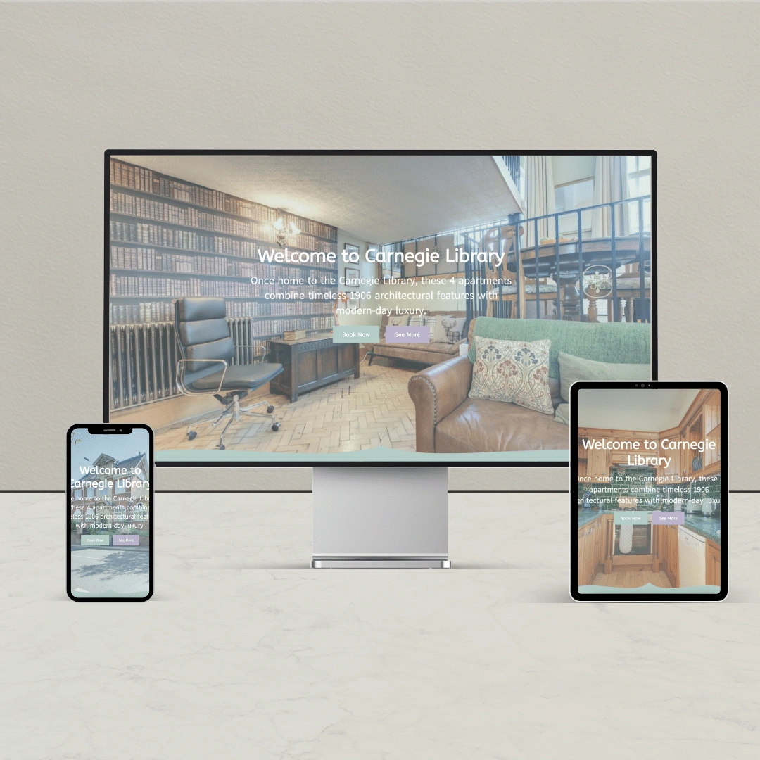 This shows an example of a website that advertises Carnegie Library Apartment, as shown on a desktop, laptop and tablet.
